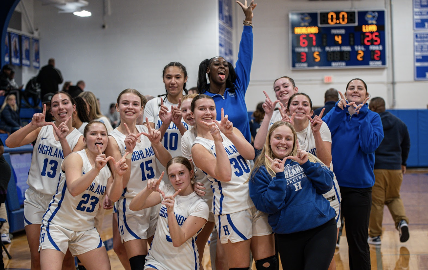 The Ladybirds celebrate a big win, 67-25, over Lloyd Memorial high school.
